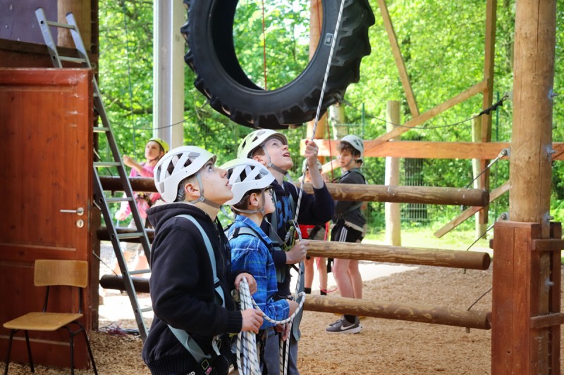 Students on the high ropes course at DJH Hellenthal Germany