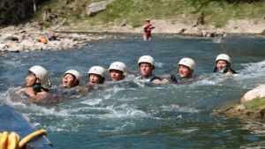 Floating down river in helmets