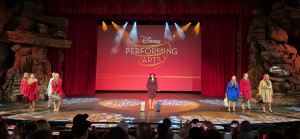 Group performance on stage Disney