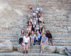 Students and teachers on steps Greek theatre