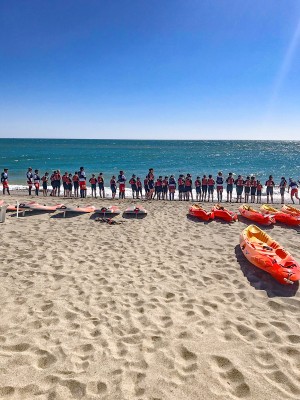 Students lined up on the beach at Argeles