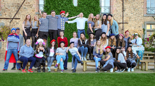 Teenage students outside the chateau