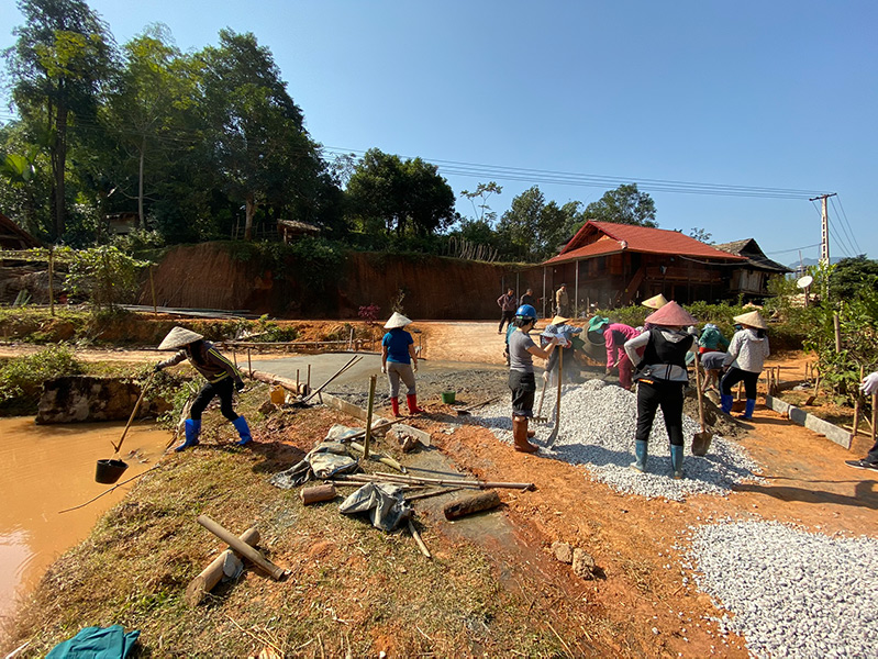 Volunteering with the construction of a road